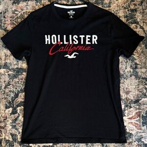 Hollister Black Tee with Red and White Logo